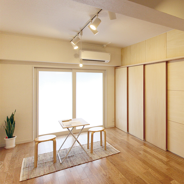 With a wooden wall